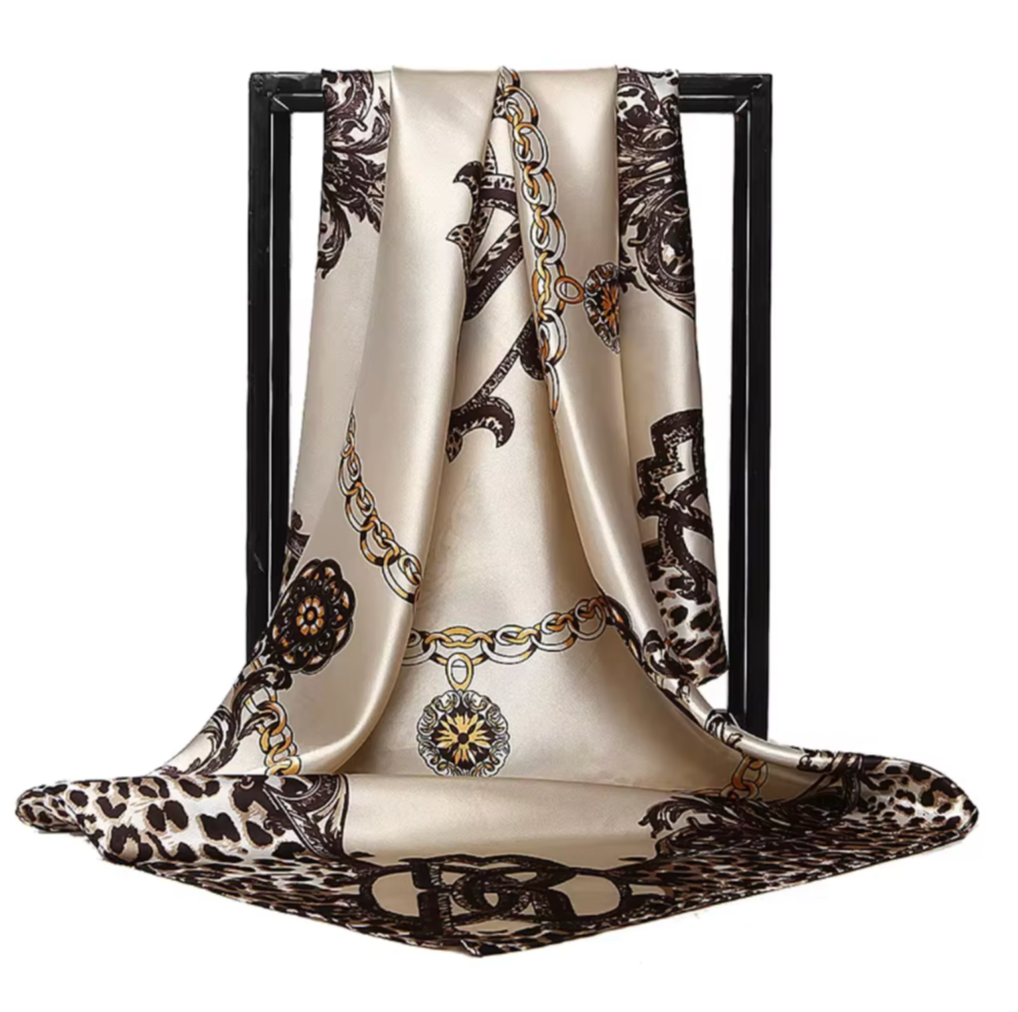 Decorative scarf with chain and leopard print pattern on a white background