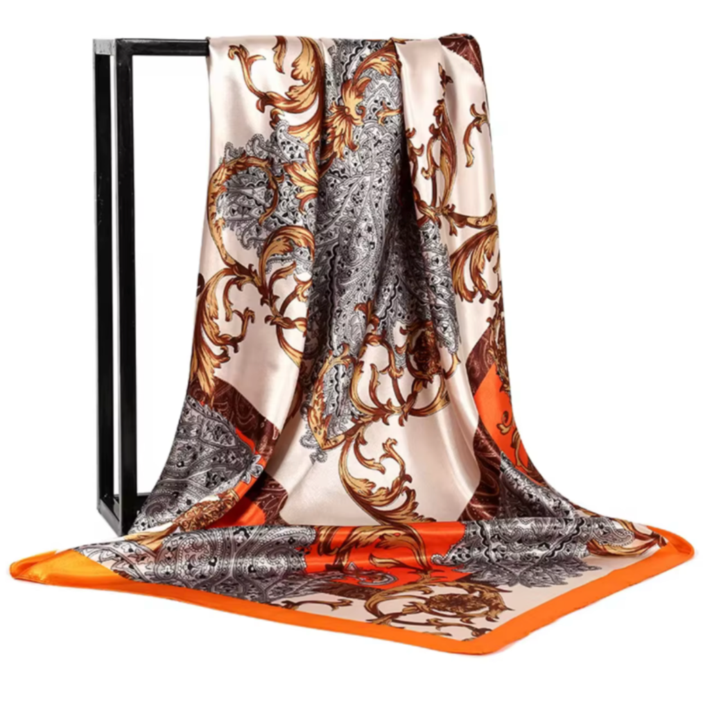 Decorative scarf with intricate patterns on a white background