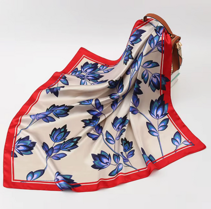 Floral patterned scarf with blue flowers on a white background