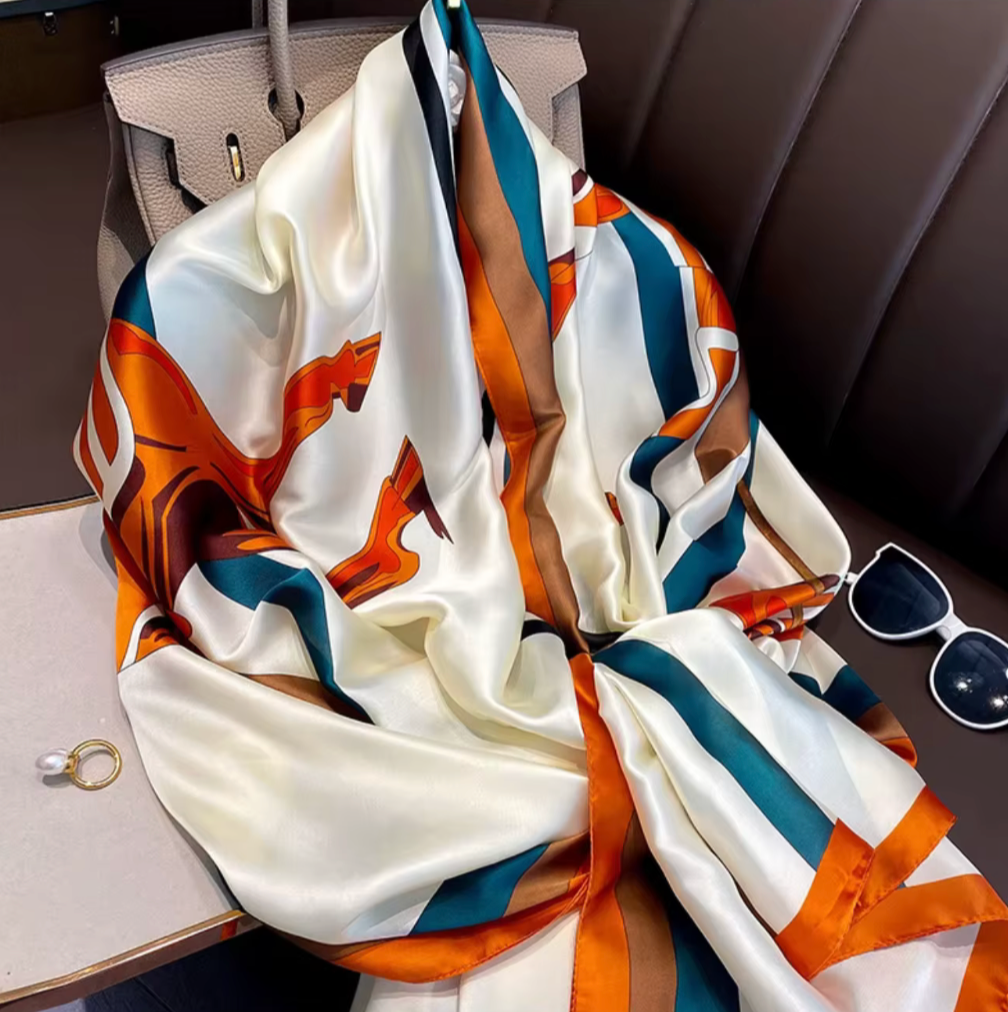 Colorful scarf with abstract patterns on a car seat